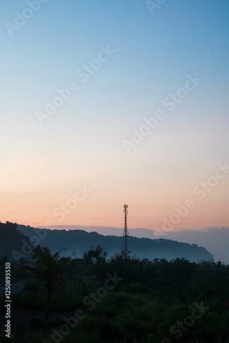 morning sunrise with the tower in the middle photo