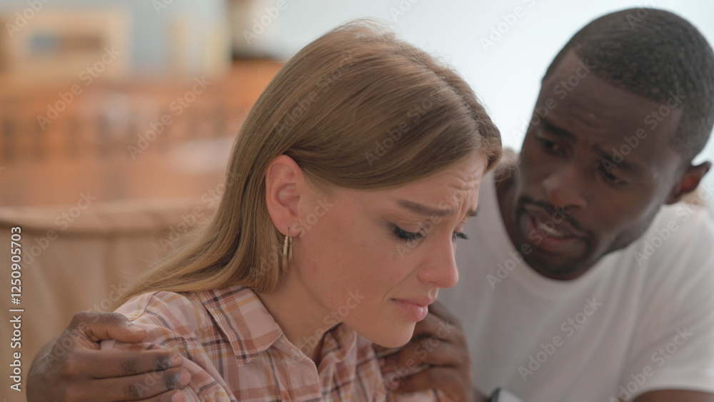 Close up of African Man Consoling Depressed Crying Wife
