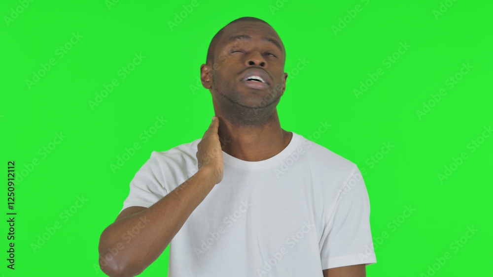 Portrait of African Man with Neck Pain on Green Background Portrait of African Man with Neck Pain on Green Background