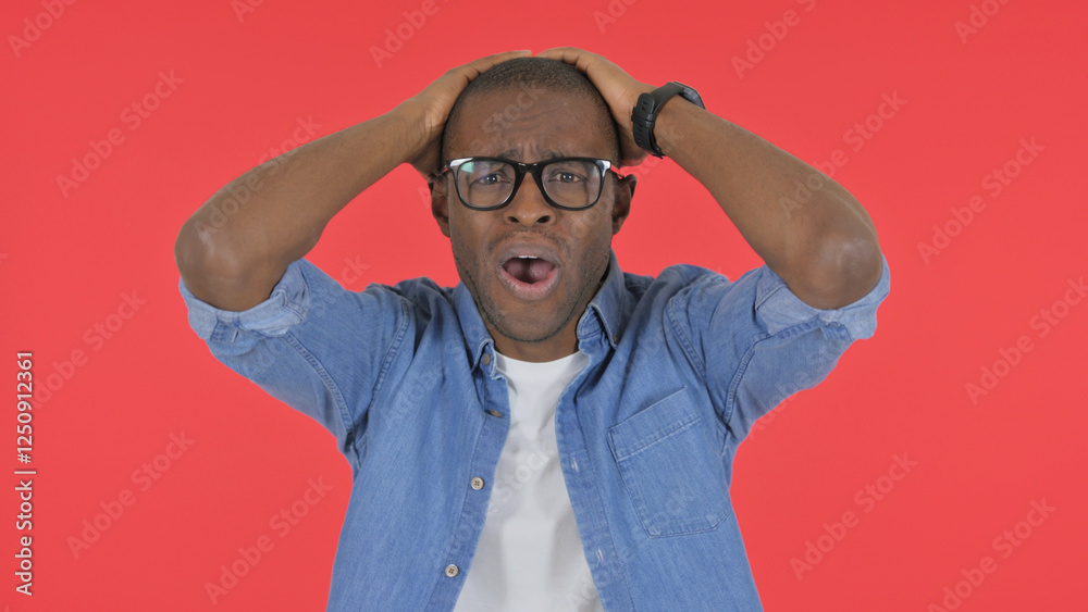 Fototapeta premium Casual African Man Reacting to Failure on Red Background, Portrait