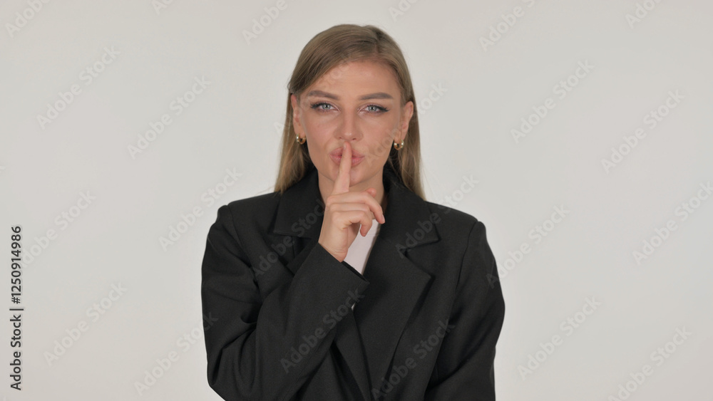 Portrait of Threatening Businesswoman with Finger on Lips on White Background Portrait of Threatening Businesswoman with Finger on Lips on White Background