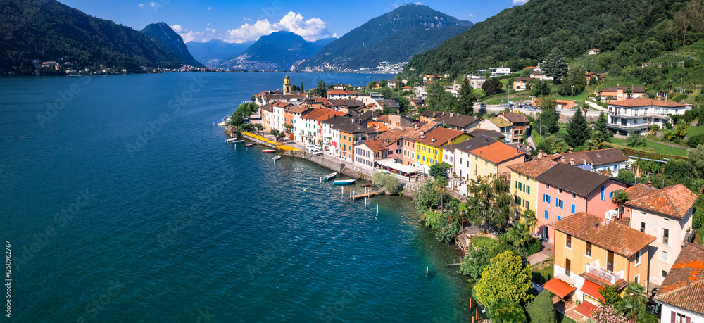 Switzerland scenic places, Lugano lake, beautiful colorful village Brusino Arsizio (canton Ticino) aerial panoramic view.