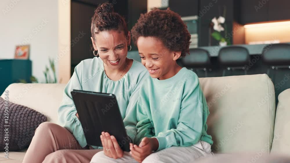 Mother, child and laughing with tablet in home for comedy video, playing game and bonding together. African family, woman or boy with digital tech for learning app, or weekend entertainment and humor Mother, child and laughing with tablet in home for comedy video, playing game and bonding together. African family, woman or boy with digital tech for learning app, or weekend entertainment and humor