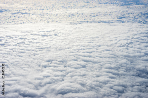 Obraz na płótnie View of clouds from airplane window, clouds in a blue sky w salonie