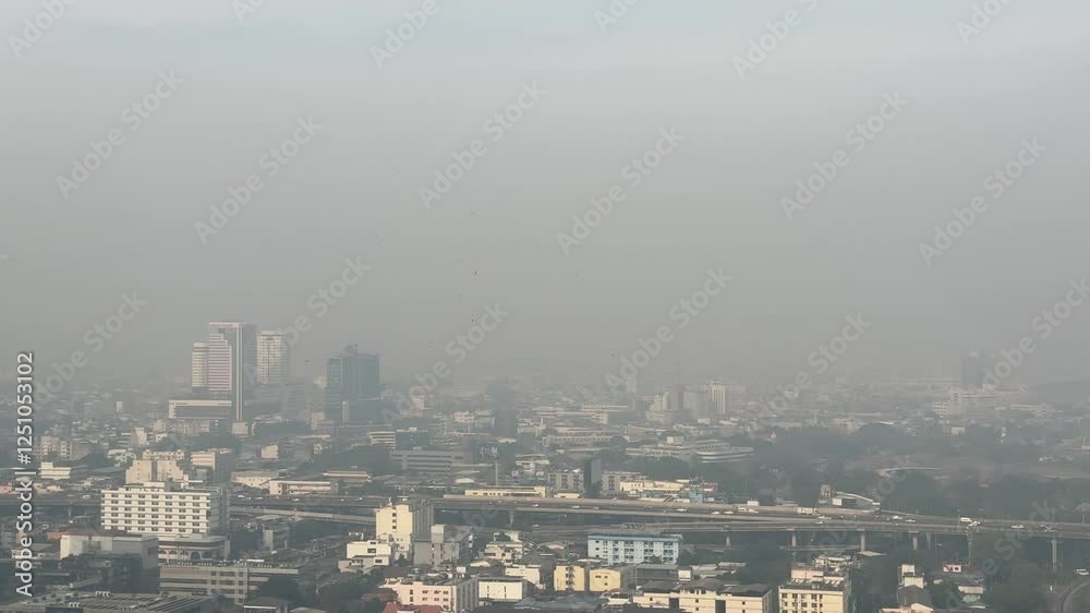 Drone captures a very bad air pollution veering Bangkok skyline at the daytime Drone captures a very bad air pollution veering Bangkok skyline at the daytime