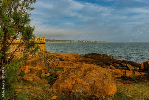 Sea coast and hotel at sunset in Punta del Este, Uruguay