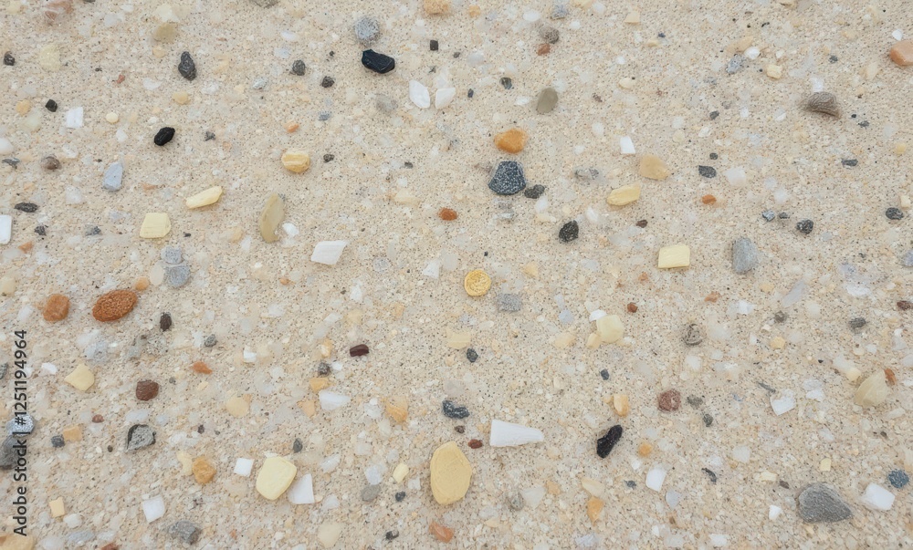 Colorful beach sand with pebbles and shells Colorful beach sand with pebbles and shells
