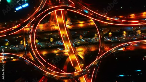 Chengdu Longquanyi illuminated roadways at night showcasing vibrant urban life and traffic flow