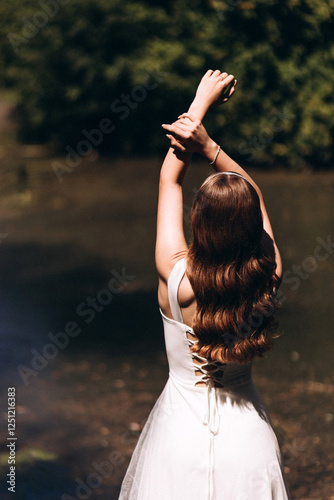 young woman in white dress