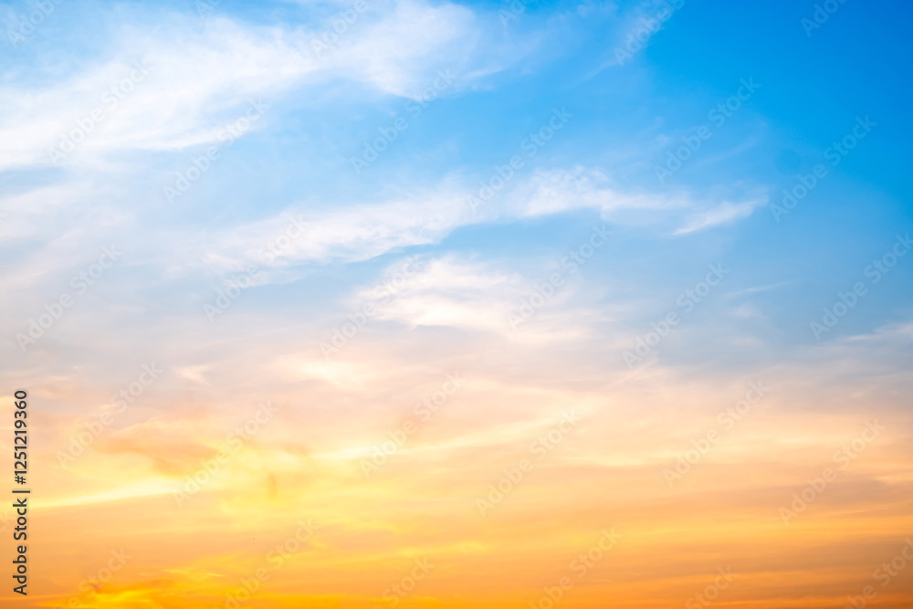 Beautiful , luxury soft gradient orange gold clouds and sunlight on the blue sky perfect for the background, take in evening,Twilight, Large size, high definition landscape photo Beautiful , luxury soft gradient orange gold clouds and sunlight on the blue sky perfect for the background, take in evening,Twilight, Large size, high definition landscape photo