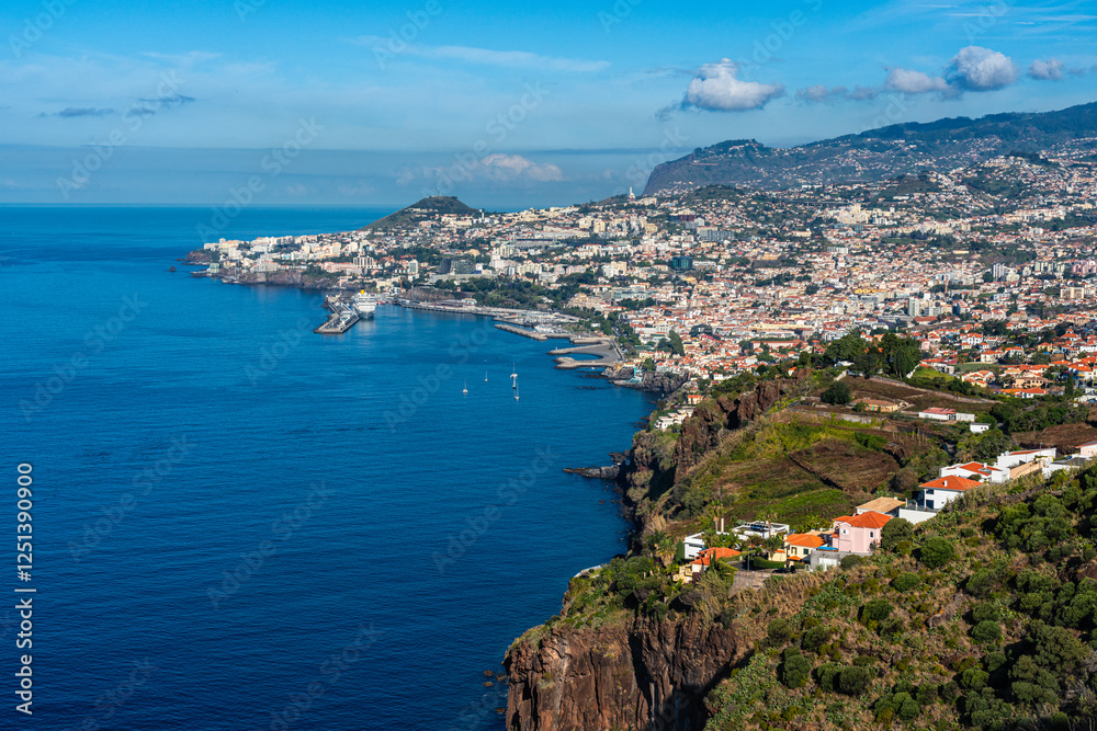 Fototapeta premium Scenic panoramic view from Miradouro do Pinaculo on a summer morning, Funchal, Madeira island, Portugal.