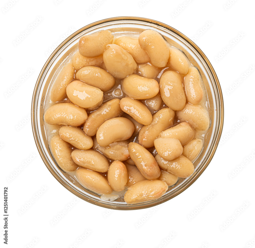 Glass bowl overflowing with delicious canned white beans on white background Glass bowl overflowing with delicious canned white beans on white background