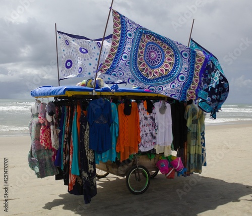 Street vendor on a beach in Brazil with various products