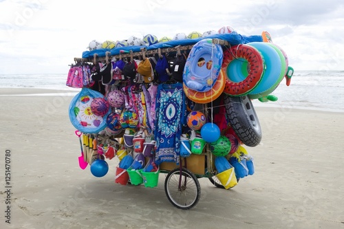 Street vendor on a beach in Brazil with various products