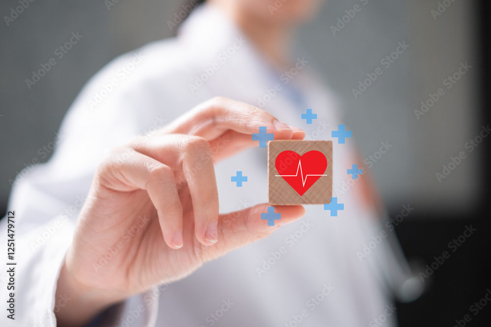 Professional healthcare medical worker holding red heart with cardiogram on wooden block cardiologist concept Professional healthcare medical worker holding red heart with cardiogram on wooden block cardiologist concept