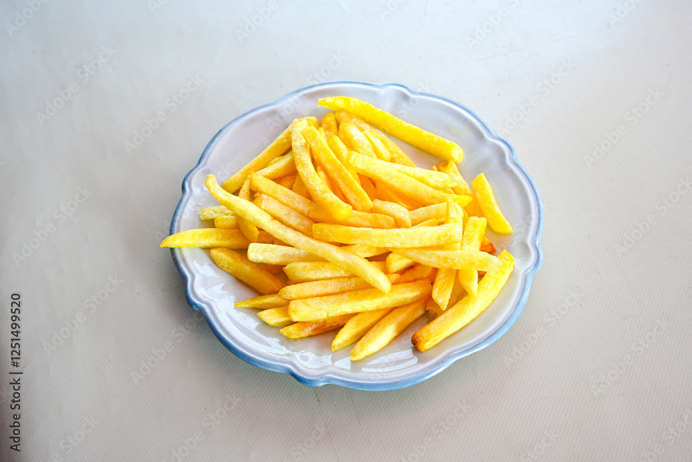 French fries Snack food crispy potato . Fast food or snacks concept. Patates cips. Patates kizartmasi. French fries Snack food crispy potato . Fast food or snacks concept. Patates cips. Patates kizartmasi.