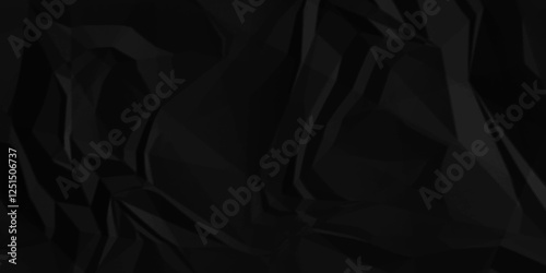 Black crumpled paper texture. black wrinkled paper texture. black paper texture. black crumpled and top view textures can be used for background of text or any contents.	