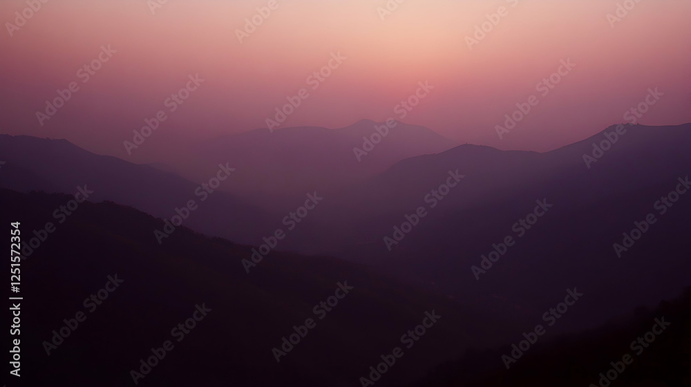 Mountain Range Silhouette at Dusk with Soft Purple Hues Mountain Range Silhouette at Dusk with Soft Purple Hues