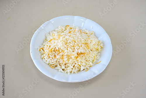 Traditional delicious Turkish food; Turkish style rice pilaf (Turkish name; Arpa sehriyeli. tavuk, kuru fasulyeli, pirinc pilavi). Cigerli, kavurmali, tereyagli nohut pilav.
 photo