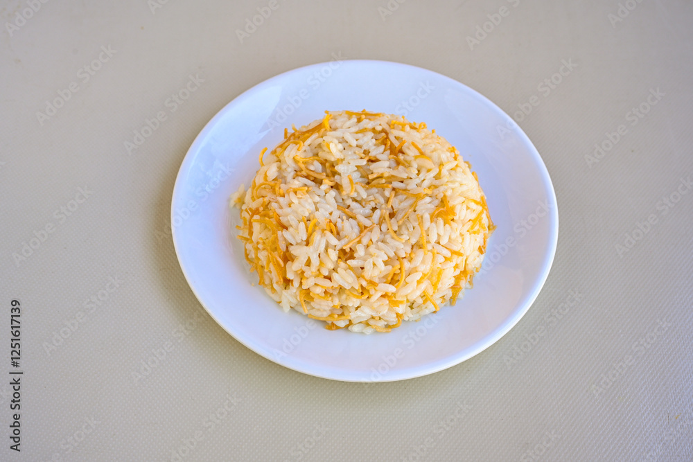 Traditional delicious Turkish food; Turkish style rice pilaf (Turkish name; Arpa sehriyeli. tavuk, kuru fasulyeli, pirinc pilavi). Cigerli, kavurmali, tereyagli nohut pilav.
Traditional delicious Turkish food; Turkish style rice pilaf (Turkish name; Arpa sehriyeli. tavuk, kuru fasulyeli, pirinc pilavi). Cigerli, kavurmali, tereyagli nohut pilav.