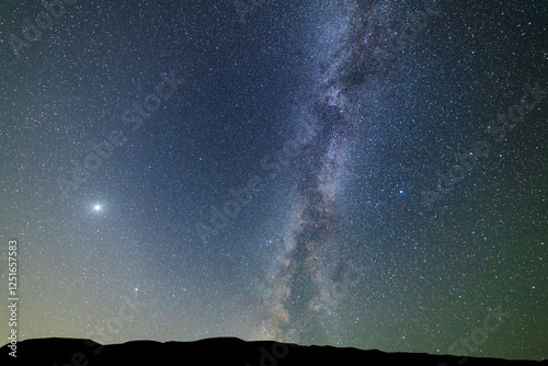 Fototapeta Naklejka Na Ścianę i Meble -  Beautiful bright Milky Way on the starry sky. Night ladscape.