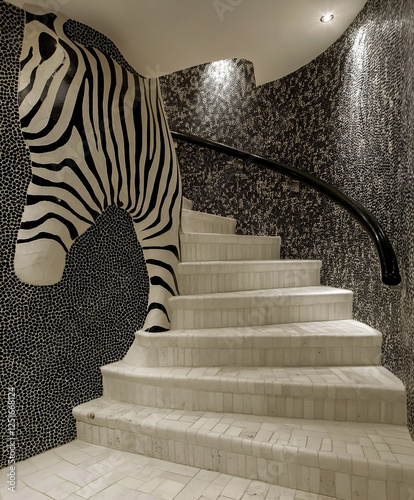 Staircase design with a zebra pattern, in white and black colors, stairs made of stone material. photo