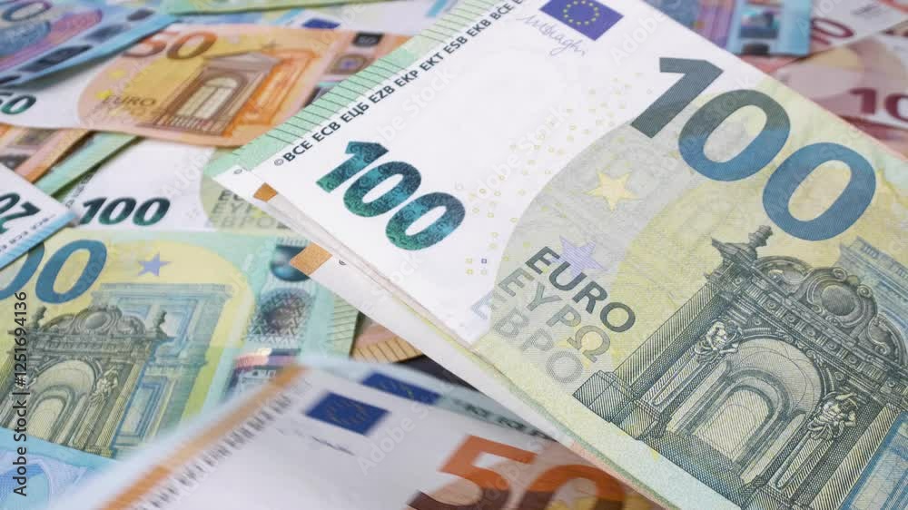Close-up of counting euro banknotes. Cash money calculation with euro banknotes in the background. Close-up of counting euro banknotes. Cash money calculation with euro banknotes in the background.