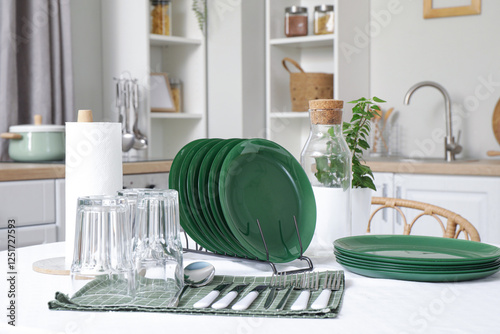 Set of clean dishes and gla...