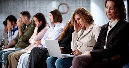 Group of unemployed job seekers waiting photo
