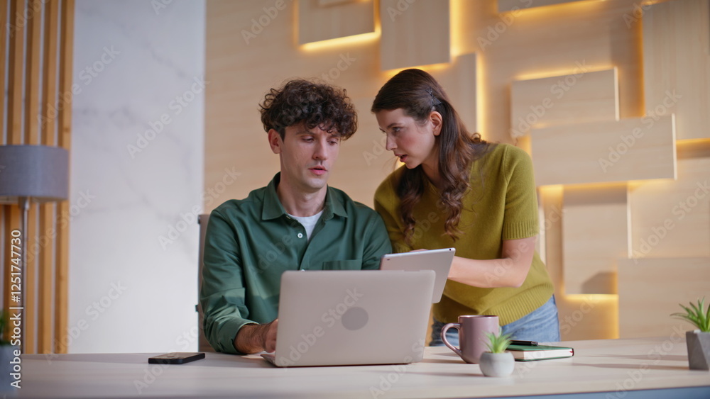 Professional manager consulting coworker in office solving task problem. Professional manager consulting coworker in office solving task problem.
