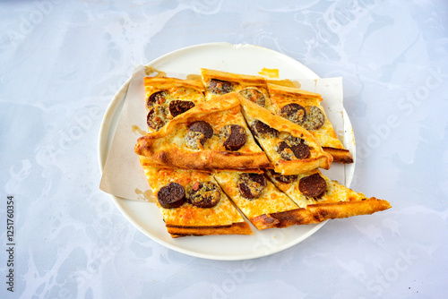 Kiymali pide.Turkish pide with minced meat. Turkish pizza mince pita Pide on white . Etli ekmek.Kusbasi kasarli, kiymali kasarli, kiymali yumurtali, Bafra, Trabzon, Kusbasili pide. Urfa acili lahmacun photo