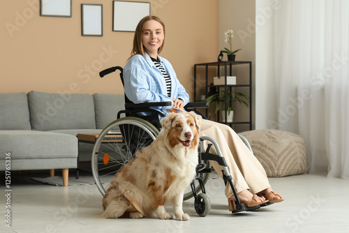 Young woman in wheelchair w...