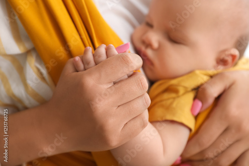 Young mother with cute litt...