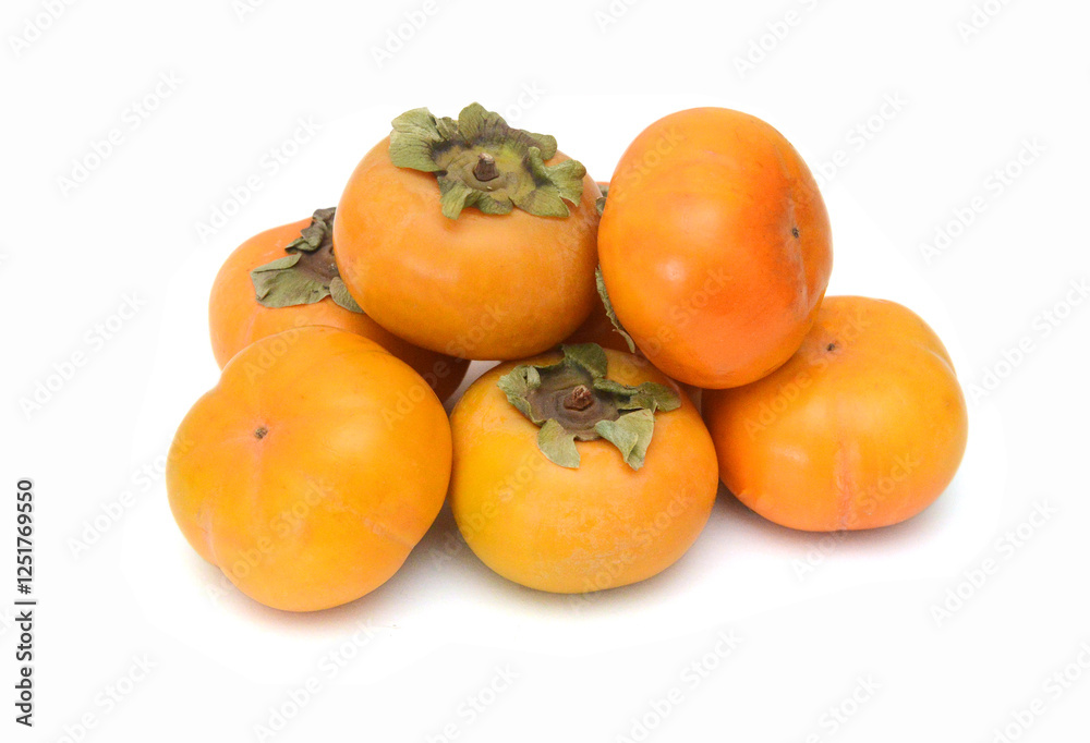 Stack persimmon fruits isolated on white background Stack persimmon fruits isolated on white background
