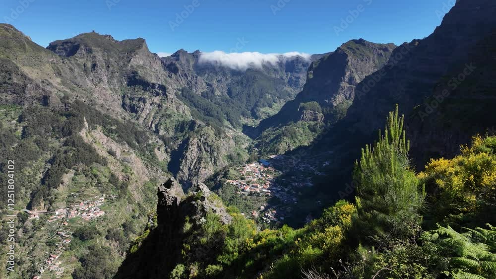 Scenic panoramic view from Miradouro do Paredao on a summer morning, Madeira island, Portugal. Scenic panoramic view from Miradouro do Paredao on a summer morning, Madeira island, Portugal.