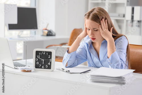 Worried young woman with cl...