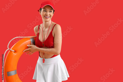 Female beach rescuer with l...