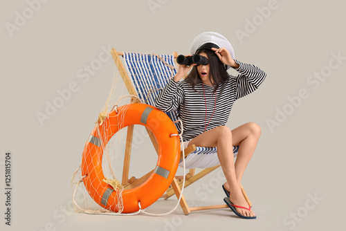 Female beach rescuer with l...
