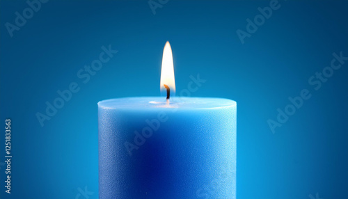 a blue candle on a blue background with a lit candle within the middle is a unmarried blue candle