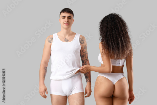 Young couple in stylish und...