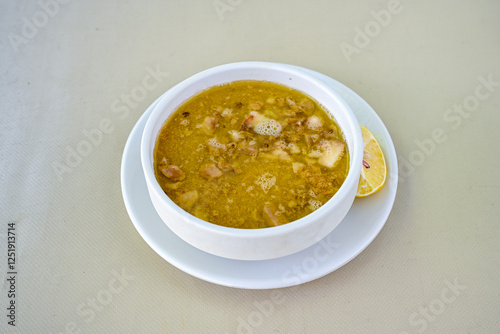 Turkish Traditional Tripe Soup. Iskembe, damar , curuk , beyran, ayak paca, kelle paca corbasi. Dil, beyin corbasi. photo