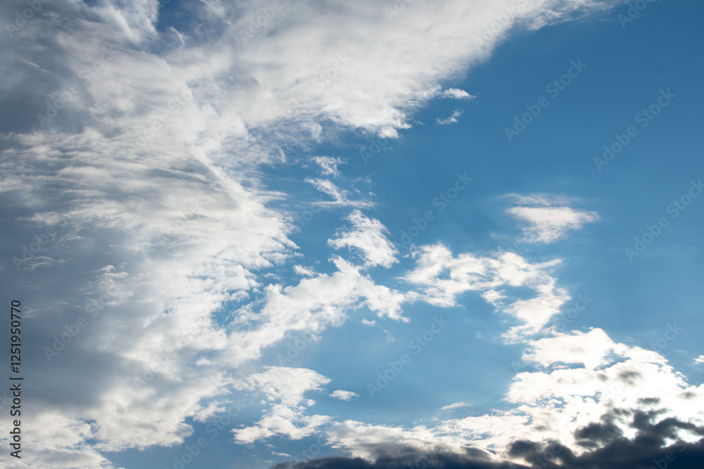 Naklejka premium clouds in the sky waning light