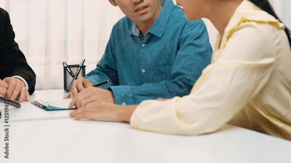 Lawyer act as mediator offer a compromise between two parties to resolve business dispute through negotiation at law firm office. Legal mediation and conflict resolution service. Slow motion. Rigid. Lawyer act as mediator offer a compromise between two parties to resolve business dispute through negotiation at law firm office. Legal mediation and conflict resolution service. Slow motion. Rigid.
