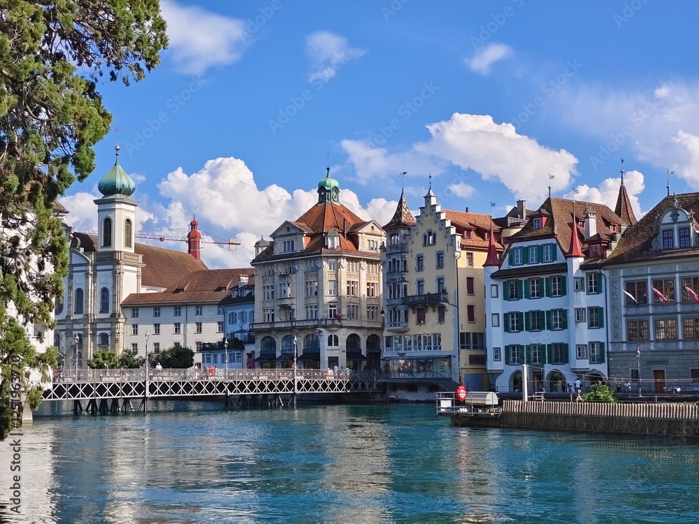 Reuss Bridge and Jesuit Church in Lucerne, Switzerland Reuss Bridge and Jesuit Church in Lucerne, Switzerland