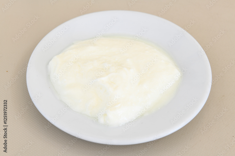 Delicious yogurt scene with Casserole bowl. Closeup shot of healthy fresh yogurt. Karisik kizartma. Top view. Delicious yogurt scene with Casserole bowl. Closeup shot of healthy fresh yogurt. Karisik kizartma. Top view.
