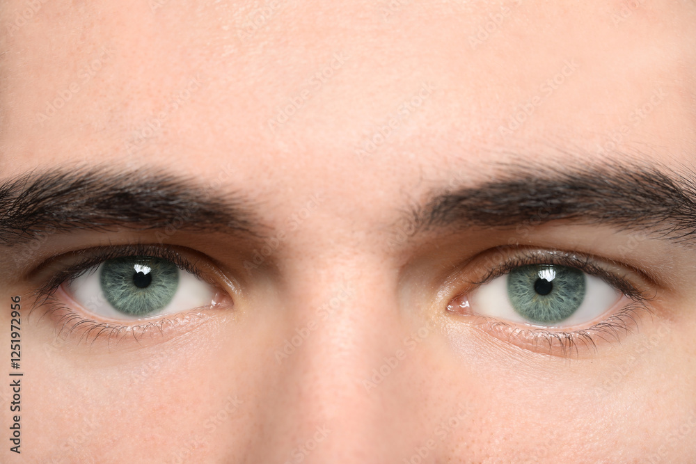 Fototapeta premium Closeup view of man with blue eyes