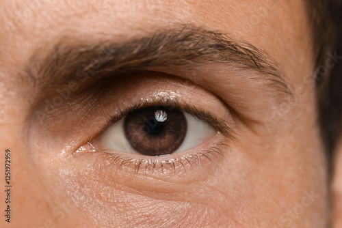 Closeup view of man with brown eyes