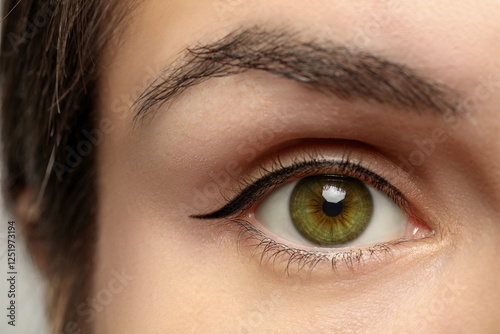 Closeup view of woman with green eyes