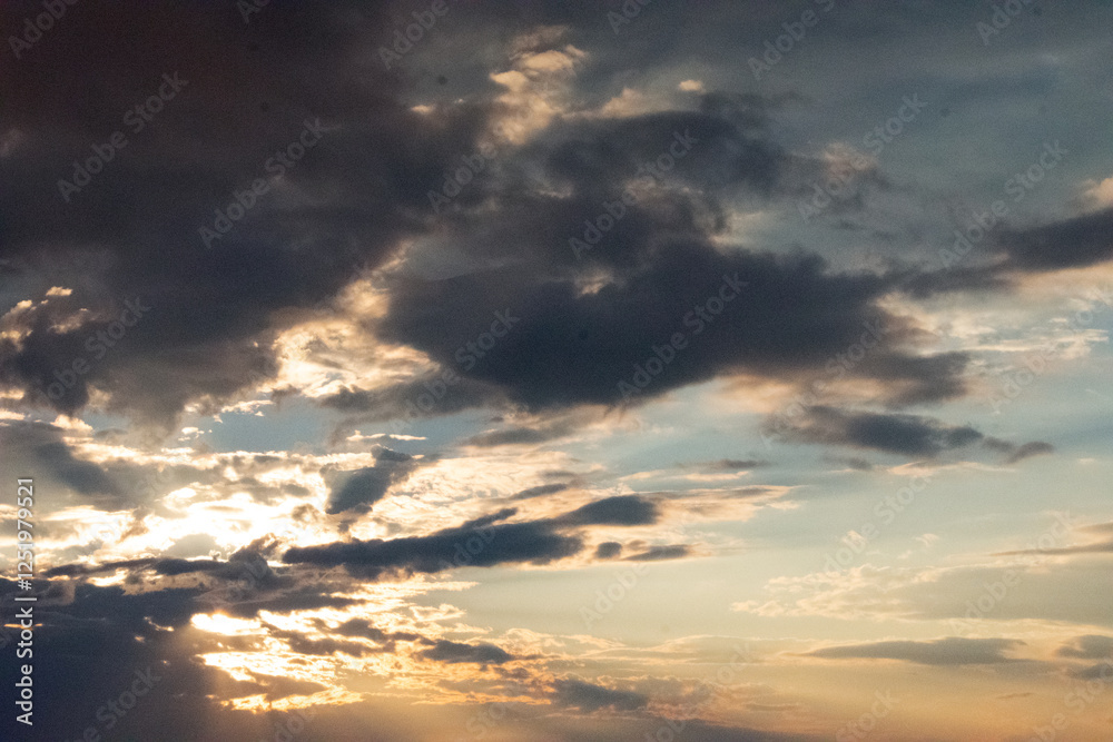 Light coming through the clouds at dawn Light coming through the clouds at dawn