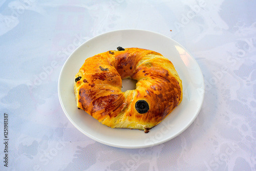 Turkish pastry product , tasty pogaca, acma . Simit, gevrek. Turkish Pastries; peynirli, patatesli, kasarli pogaca, sosili acma, dereotlu pogaca,  borek, acma, ay coregi at patisserie showcase. photo